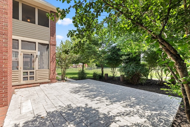4465 W Woodbridge Ln, New Palestine, IN 46163 - view of patio / terrace featuring a sunroom