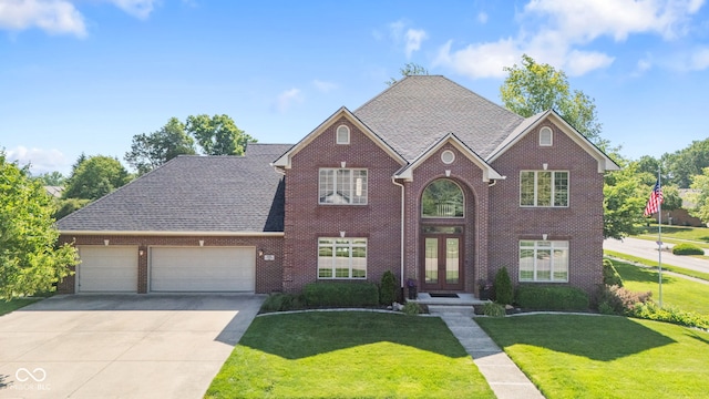 4465 W Woodbridge Ln, New Palestine, IN 46163 - traditional home with french doors, driveway, a garage, a front yard, and brick siding
