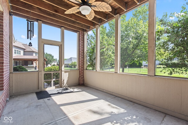 4465 W Woodbridge Ln, New Palestine, IN 46163 - unfurnished sunroom featuring a ceiling fan and healthy amount of natural light