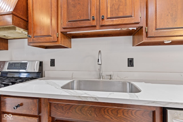 4465 W Woodbridge Ln, New Palestine, IN 46163 - kitchen with stainless steel range, brown cabinets, light stone counters, and premium range hood