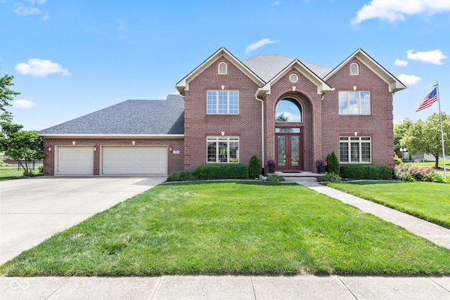 4465 W Woodbridge Ln, New Palestine, IN 46163 - traditional home with french doors, a garage, concrete driveway, a front lawn, and brick siding