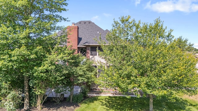 4465 W Woodbridge Ln, New Palestine, IN 46163 - view of home's exterior with a chimney