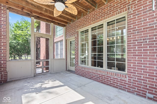 4465 W Woodbridge Ln, New Palestine, IN 46163 - unfurnished sunroom with a ceiling fan