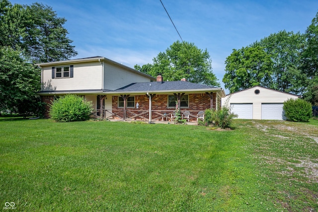5081 N 500 W, Fairland, IN 46126 - view of front of property featuring a detached garage, a chimney, covered porch, an outbuilding, and a front lawn