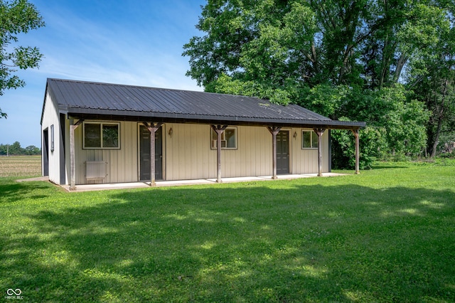 5081 N 500 W, Fairland, IN 46126 - view of front facade with a front lawn and a metal roof