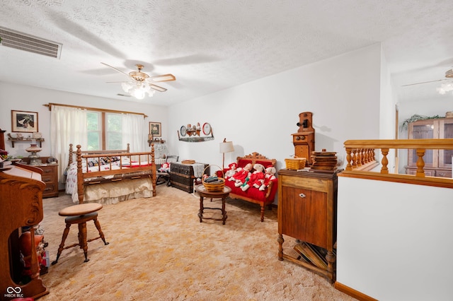 5081 N 500 W, Fairland, IN 46126 - living area featuring light carpet, ceiling fan, and a textured ceiling