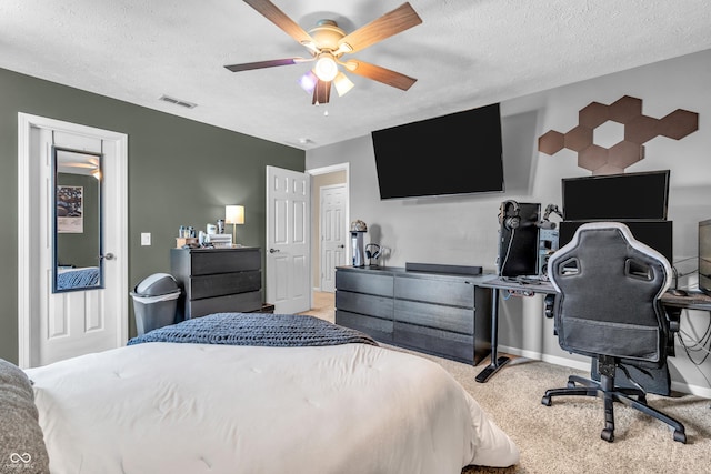 7047 Lancaster Ln, Avon, IN 46123 - bedroom with light carpet, a textured ceiling, an office area, and ceiling fan