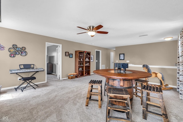 7047 Lancaster Ln, Avon, IN 46123 - carpeted dining room with ceiling fan and baseboards