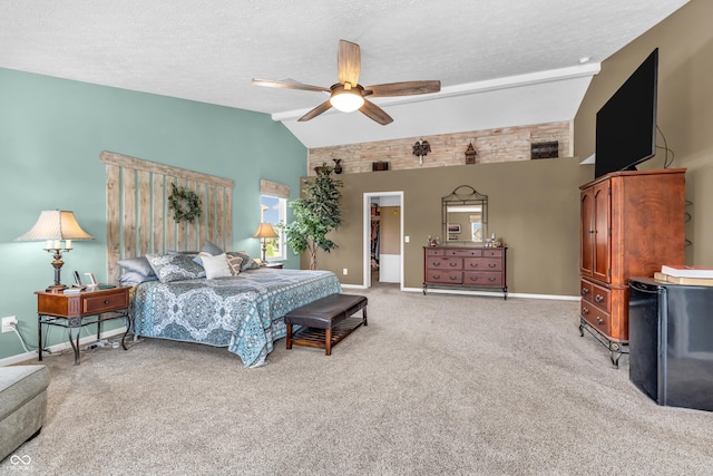 7047 Lancaster Ln, Avon, IN 46123 - bedroom with black fridge, light colored carpet, a textured ceiling, a ceiling fan, and a walk in closet