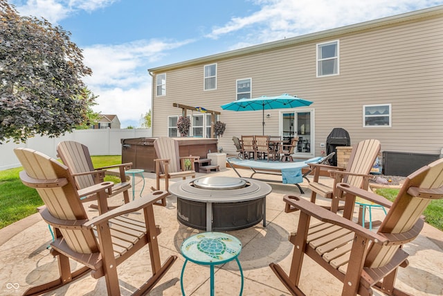 7047 Lancaster Ln, Avon, IN 46123 - view of patio with a fire pit, a hot tub, outdoor dining space, and area for grilling
