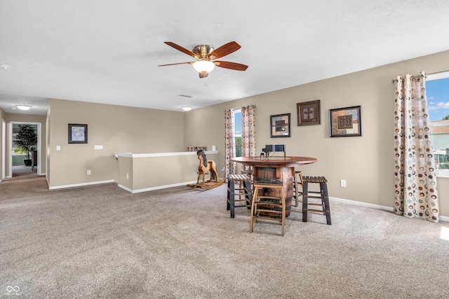 7047 Lancaster Ln, Avon, IN 46123 - dining space with a ceiling fan and carpet