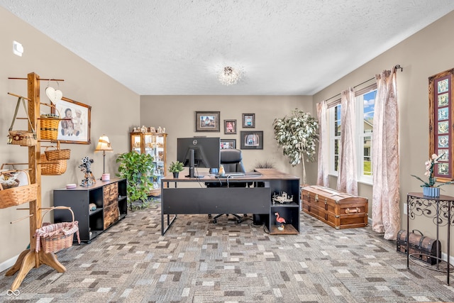 7047 Lancaster Ln, Avon, IN 46123 - carpeted home office with a textured ceiling