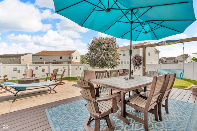 7047 Lancaster Ln, Avon, IN 46123 - wooden deck featuring outdoor dining space, a fenced backyard, and a residential view