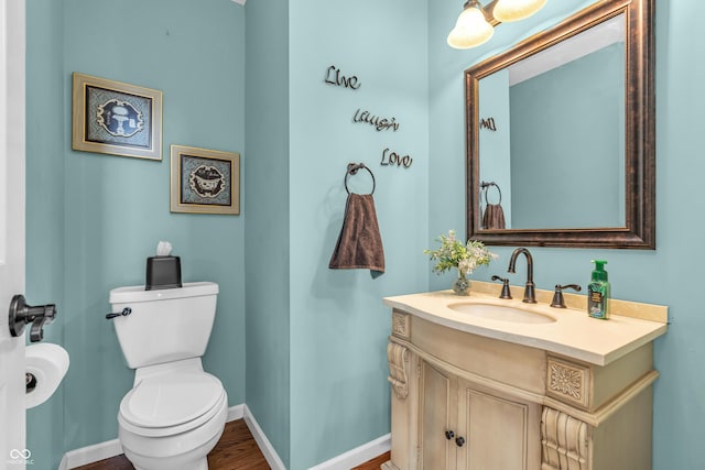 7047 Lancaster Ln, Avon, IN 46123 - half bathroom featuring vanity and toilet