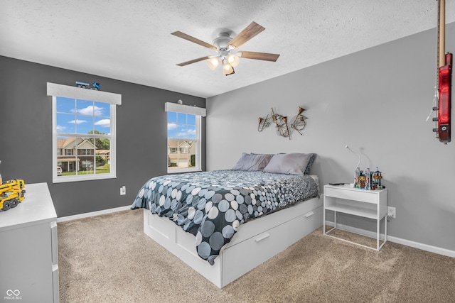 7047 Lancaster Ln, Avon, IN 46123 - carpeted bedroom with a textured ceiling and a ceiling fan