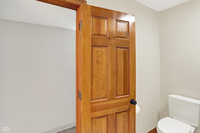 369 Rodeo Dr, Indianapolis, IN 46217 - bathroom featuring toilet and baseboards