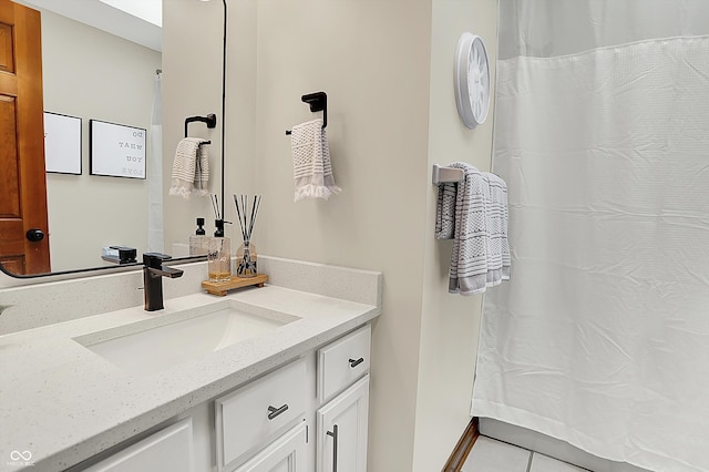 369 Rodeo Dr, Indianapolis, IN 46217 - full bath with vanity, tile patterned flooring, and a shower with shower curtain