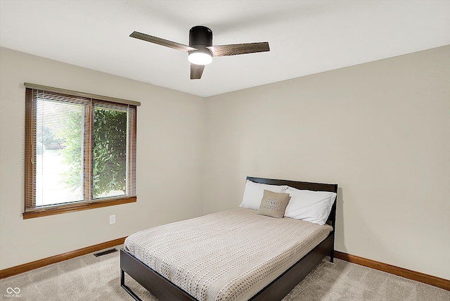369 Rodeo Dr, Indianapolis, IN 46217 - bedroom with light colored carpet and ceiling fan