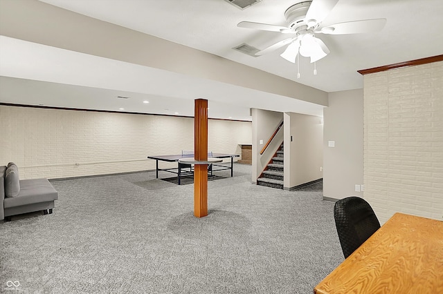 369 Rodeo Dr, Indianapolis, IN 46217 - game room featuring a ceiling fan, carpet floors, and brick wall