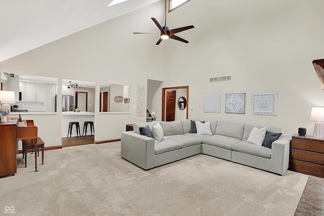 369 Rodeo Dr, Indianapolis, IN 46217 - living room featuring high vaulted ceiling, ceiling fan, and carpet