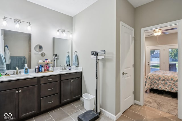 1209 E Wabash St, Frankfort, IN 46041 - full bath with double vanity, tile patterned flooring, ceiling fan, and connected bathroom
