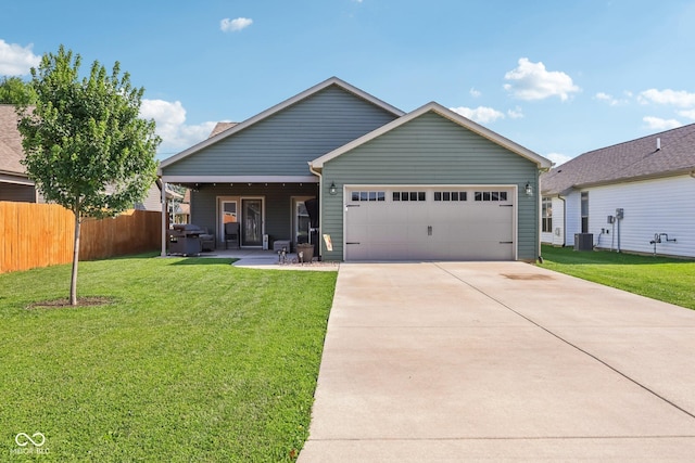 1209 E Wabash St, Frankfort, IN 46041 - view of front of property with a garage and driveway