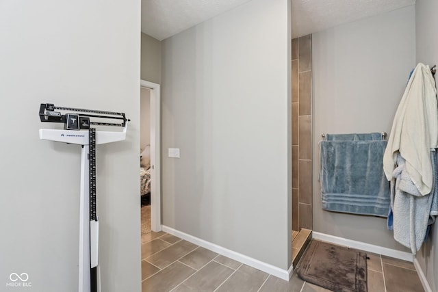 1209 E Wabash St, Frankfort, IN 46041 - ensuite bathroom with tiled shower and baseboards