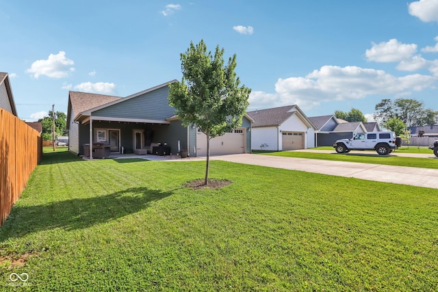 1209 E Wabash St, Frankfort, IN 46041 - rear view of house featuring concrete driveway and a garage