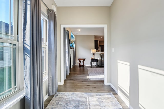 1209 E Wabash St, Frankfort, IN 46041 - hallway with wood finished floors and baseboards