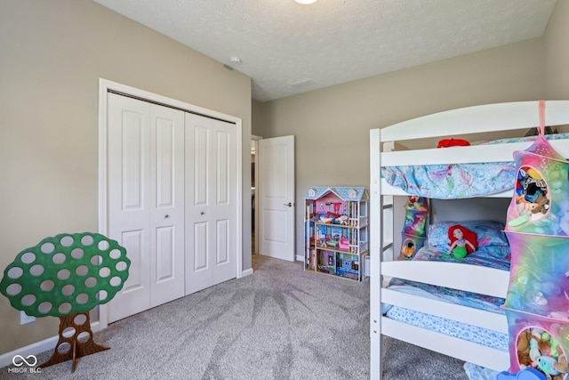 1209 E Wabash St, Frankfort, IN 46041 - carpeted bedroom with a closet and a textured ceiling