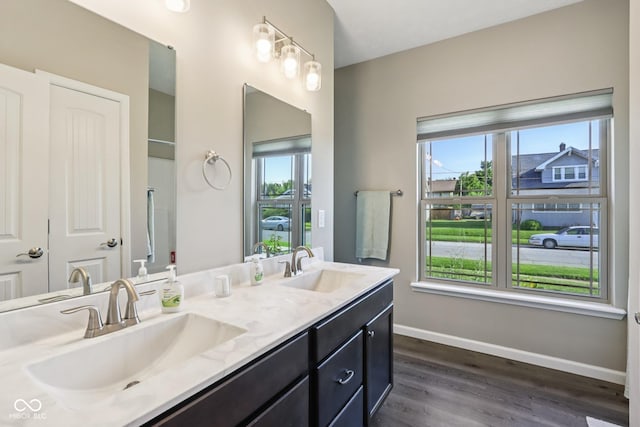 1209 E Wabash St, Frankfort, IN 46041 - full bathroom featuring double vanity and wood finished floors