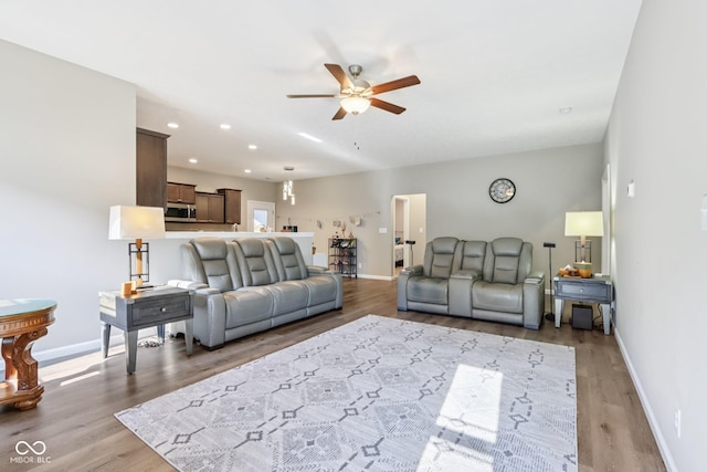 1209 E Wabash St, Frankfort, IN 46041 - living area featuring a ceiling fan, light wood-type flooring, and recessed lighting