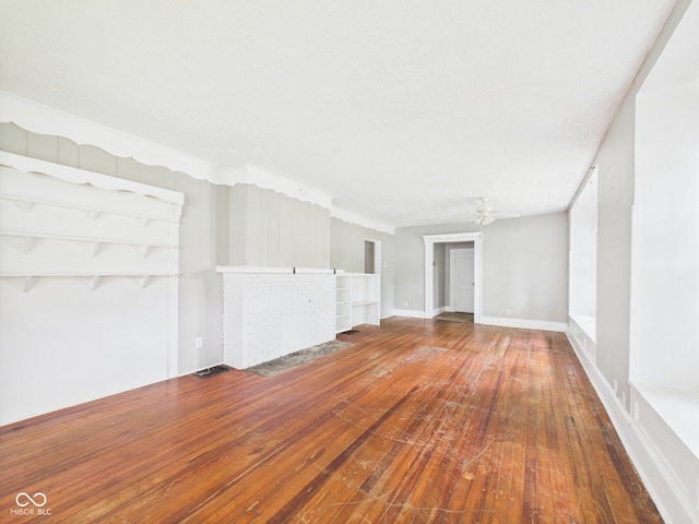 1201 Arrow Ave, Anderson, IN 46016 - unfurnished living room featuring hardwood / wood-style floors and a ceiling fan