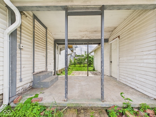 1201 Arrow Ave, Anderson, IN 46016 - view of patio / terrace featuring a carport