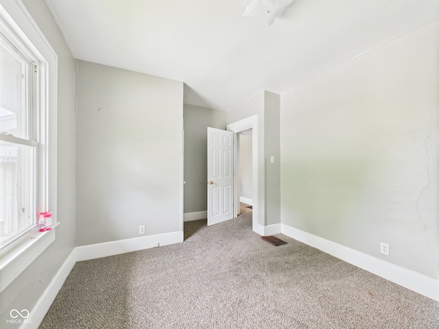 1201 Arrow Ave, Anderson, IN 46016 - carpeted empty room featuring baseboards