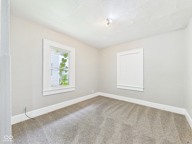 1201 Arrow Ave, Anderson, IN 46016 - carpeted empty room featuring baseboards