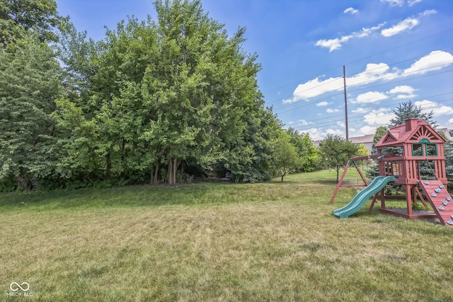 14156 Avalon E Dr, Fishers, IN 46037 - view of grassy yard with a playground