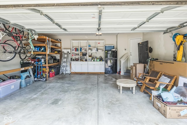 14156 Avalon E Dr, Fishers, IN 46037 - garage with freestanding refrigerator