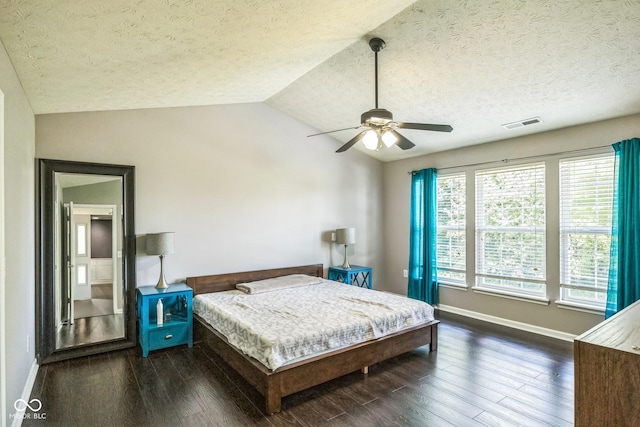 14156 Avalon E Dr, Fishers, IN 46037 - bedroom with a textured ceiling, wood finished floors, vaulted ceiling, and a ceiling fan
