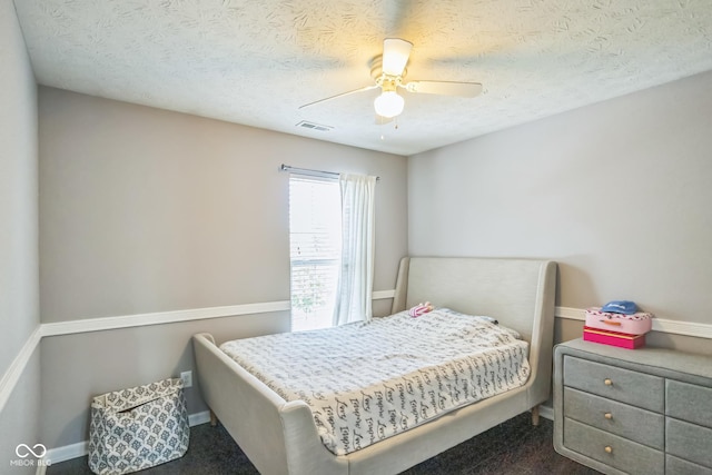 14156 Avalon E Dr, Fishers, IN 46037 - carpeted bedroom featuring a ceiling fan and a textured ceiling