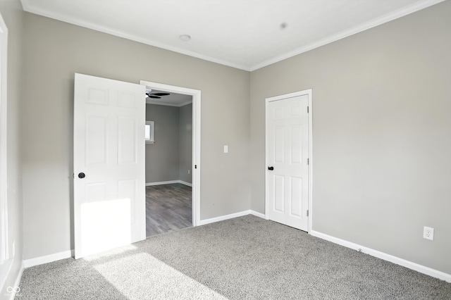 1430 W 14th St, Anderson, IN 46016 - unfurnished bedroom with ornamental molding and carpet flooring