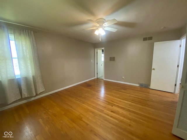 8008 Cherington Dr, Indianapolis, IN 46227 - unfurnished room with light wood-style flooring and a ceiling fan