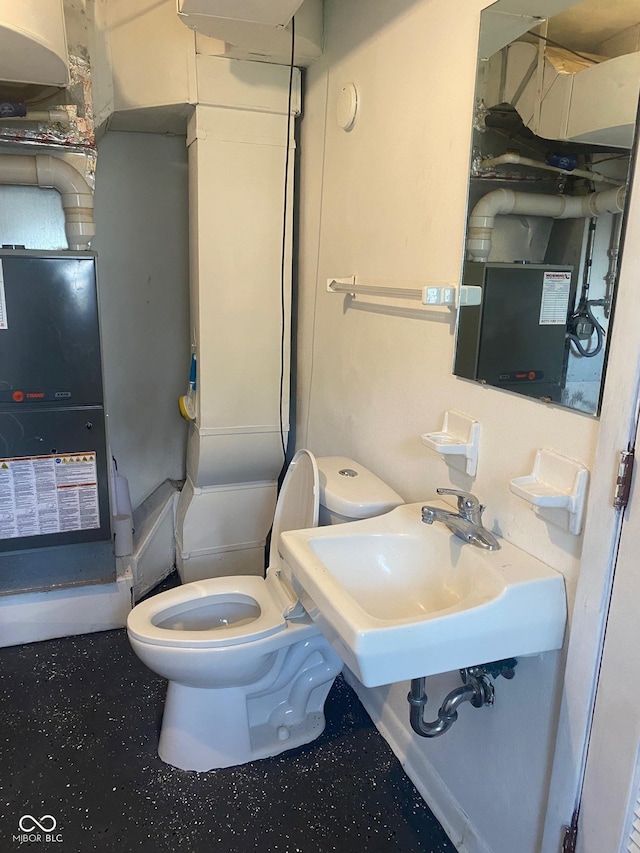 8008 Cherington Dr, Indianapolis, IN 46227 - bathroom featuring toilet and a sink