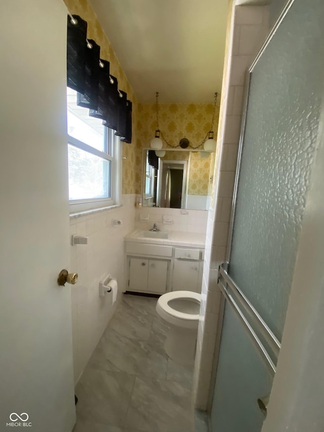 8008 Cherington Dr, Indianapolis, IN 46227 - full bath with vanity, a shower stall, and backsplash