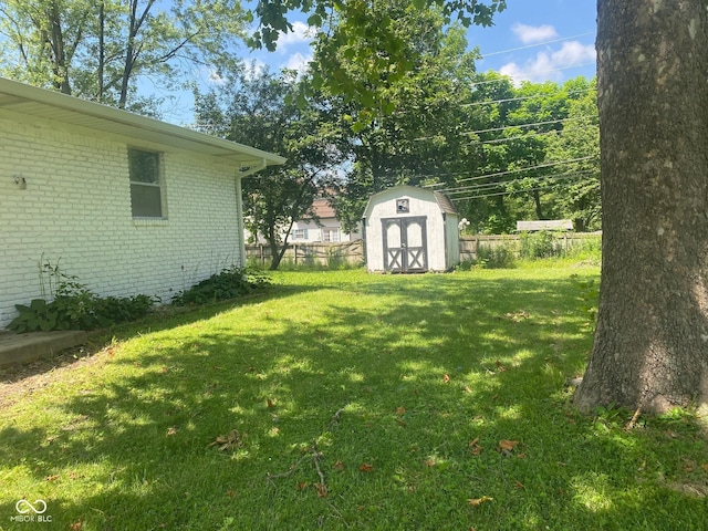 8008 Cherington Dr, Indianapolis, IN 46227 - view of yard with a storage unit
