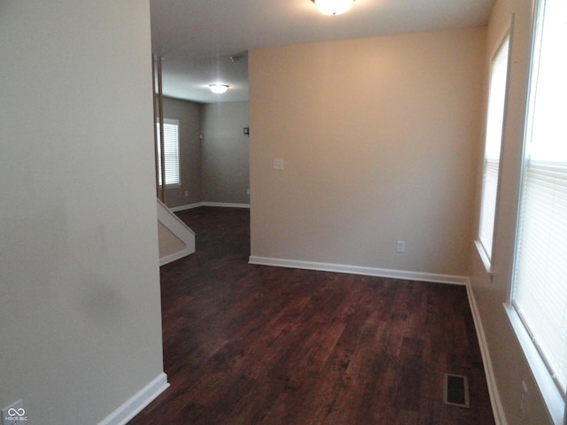 2502 N Harding St, Indianapolis, IN 46208 - spare room featuring wood finished floors and healthy amount of natural light