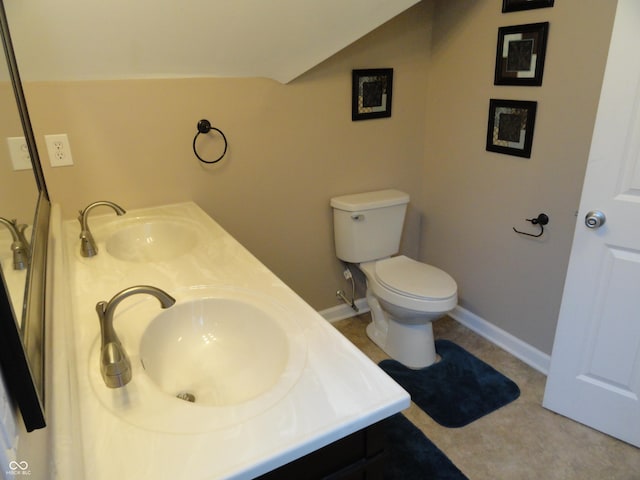 2502 N Harding St, Indianapolis, IN 46208 - bathroom with double vanity and vaulted ceiling