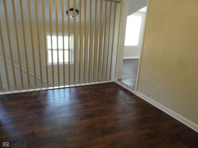 2502 N Harding St, Indianapolis, IN 46208 - empty room featuring baseboards and wood finished floors