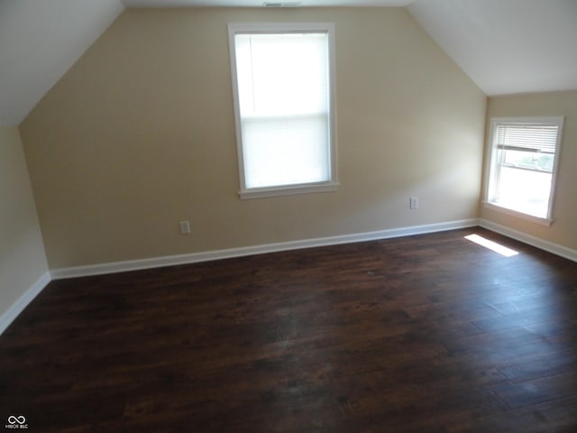 2502 N Harding St, Indianapolis, IN 46208 - bonus room with vaulted ceiling and dark wood-style flooring