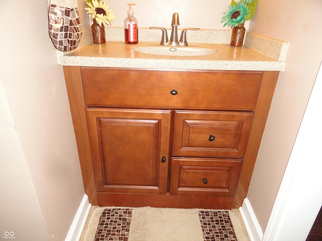 2502 N Harding St, Indianapolis, IN 46208 - bathroom featuring baseboards and vanity
